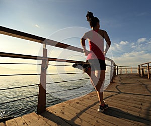 Healthy lifestyle woman running seaside