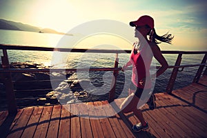 Healthy lifestyle woman running seaside