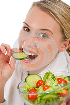 Healthy lifestyle - woman with vegetable salad
