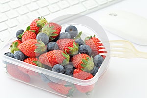 Healthy lunch box on office desk