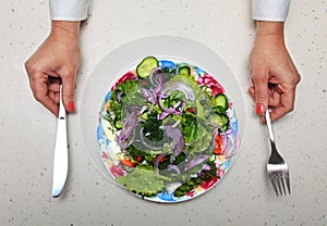 Healthy lunch and hands with kitchen flatware