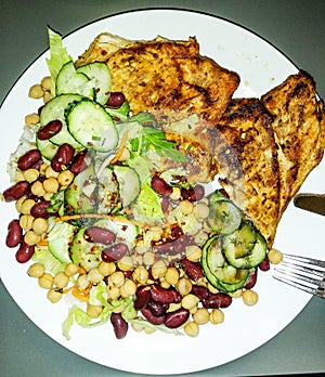 Healthy lunch salad with chicken for a fitness diet photo