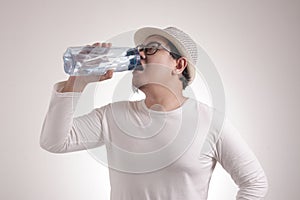 Healthy Man Drink Mineral Water in Bottle