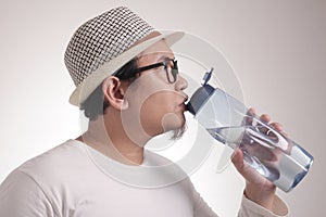 Healthy Man Drink Mineral Water in Bottle