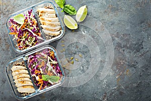 Healthy meal prep containers with quinoa and chicken