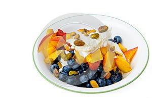 Healthy meal of yogurt with fruit and nuts