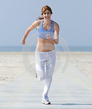 Healthy middle aged woman enjoying a jog
