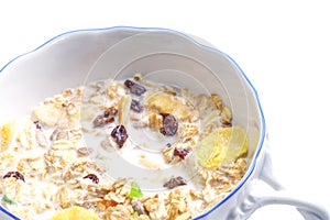 Healthy muesli in ceramic cup