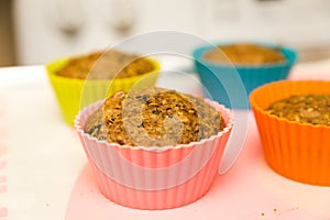 Healthy Muffins in Colorful Cups