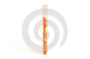 Healthy, natural carrot in a test tube, cut into cubes