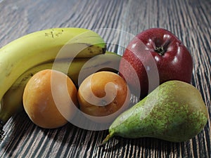 Healthy natural fruits taste tasty food delicious fruit apple nutty nutty banana pear photo