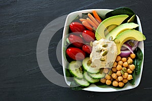 Healthy nourishment bowl with super-foods and fresh vegetables