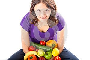 Healthy nutrition - young woman with fruits