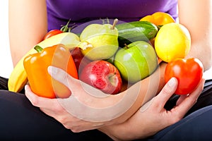 Healthy nutrition - young woman with fruits