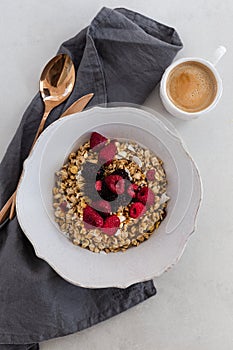 Healthy and nutritious breakfast. Granola with berries in a rustic bowl.
