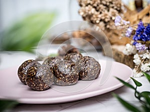 Healthy organic date energy balls with dark chocolate, dried fruits and nuts. Food for healthy lifestyle