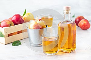 Healthy organic food. Apple cider vinegar in glass bottle. photo