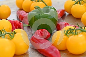 Healthy organic food green bell pepper and yellow tomatoes
