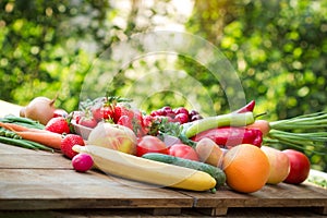 Healthy organic food on table otdoor, fresh organic fruit and vegetable - healthy eating photo