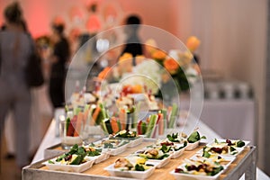 Healthy organic gluten-free delicious green snacks salads on catering table during corporate event partyÃÅ½ photo