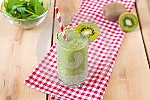 Healthy organic smoothie on the wooden background