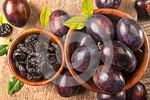 Healthy organically grown plums with dried plum fruits