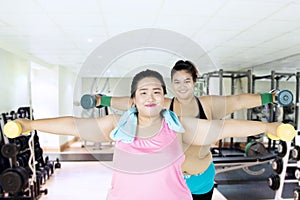 Healthy overweight women doing exercise