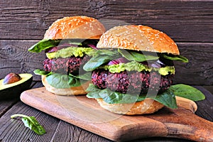 Healthy plant based beet burgers with avocado and spinach