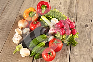 Healthy positive happy woman holding a paper shopping bag full of fruit and vegetables