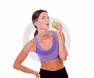 Healthy pouting woman with an apple