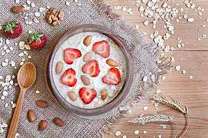 Healthy prepared oatmeal porridge breakfast with photo