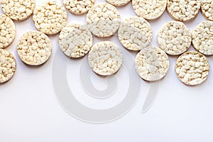 Healthy puffed rice cakes isolated on white