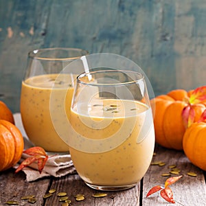 Healthy pumpkin smoothie with chia seed in glasses