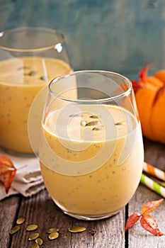 Healthy pumpkin smoothie with chia seed in glasses