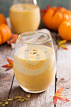 Healthy pumpkin smoothie with chia seed in glasses