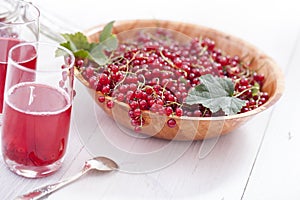 Healthy red currants in a bowl with extras