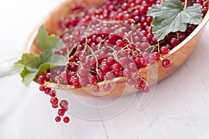 Healthy red currants in a bowl with extras