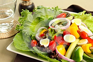 Healthy salad with quail eggs photo