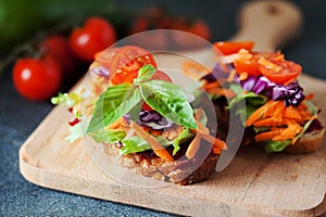 Healthy sandwich made of a fresh ciabbata with fresh vegan ingredients