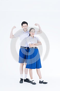 Healthy school children. Asian girl and boy in students uniform on white background