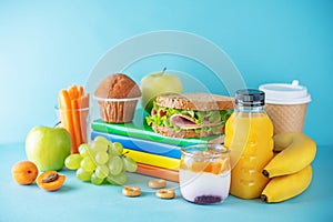 Healthy school lunch with a sandwich, fresh fruits and juice
