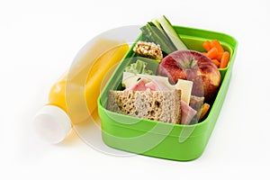 Healthy school lunch: Sandwich, vegetables ,fruit and juice isolated