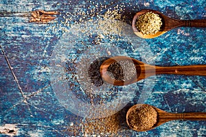 Healthy seeds on wooden spoons