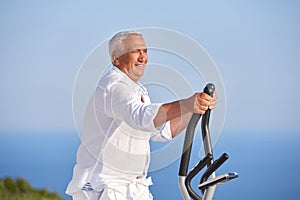 Healthy senior man working out