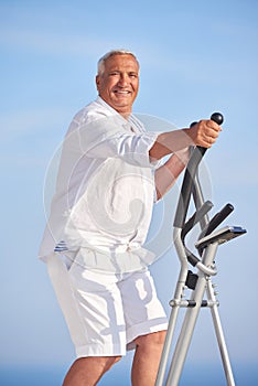 Healthy senior man working out