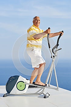 Healthy senior man working out