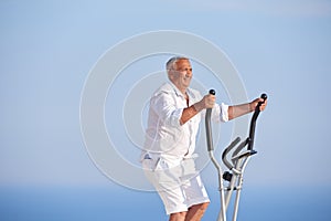 Healthy senior man working out