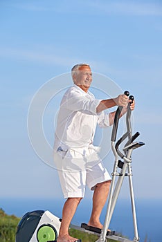 Healthy senior man working out