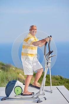 Healthy senior man working out