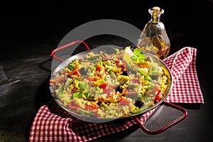 Healthy serving of paella verduras with asparagus photo